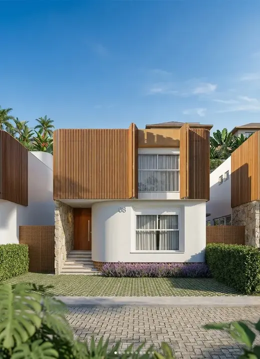Render final da fachada com brises de madeira, pedra natural e paisagismo